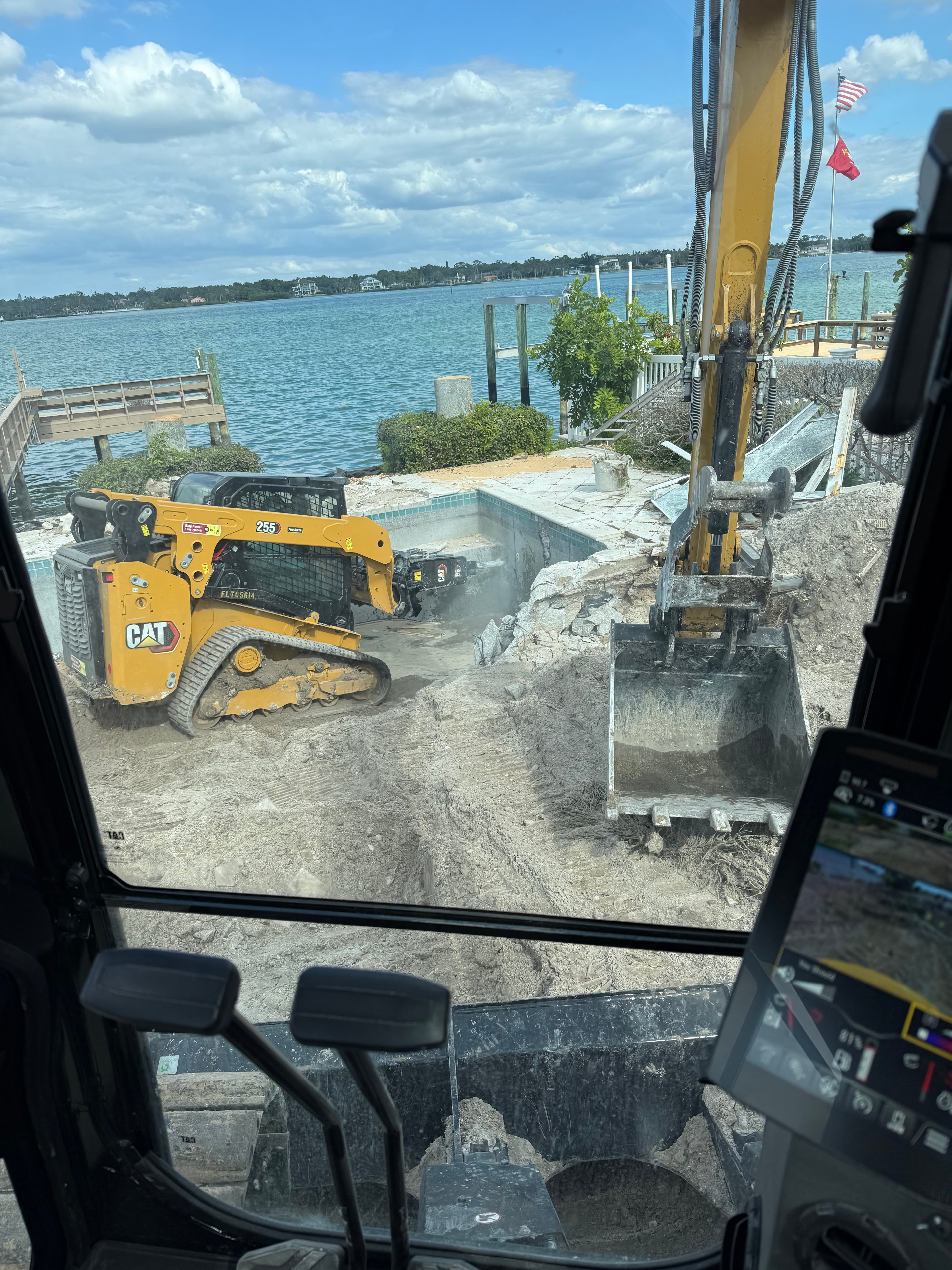 Pool demolition with compact equipment in Tampa Bay