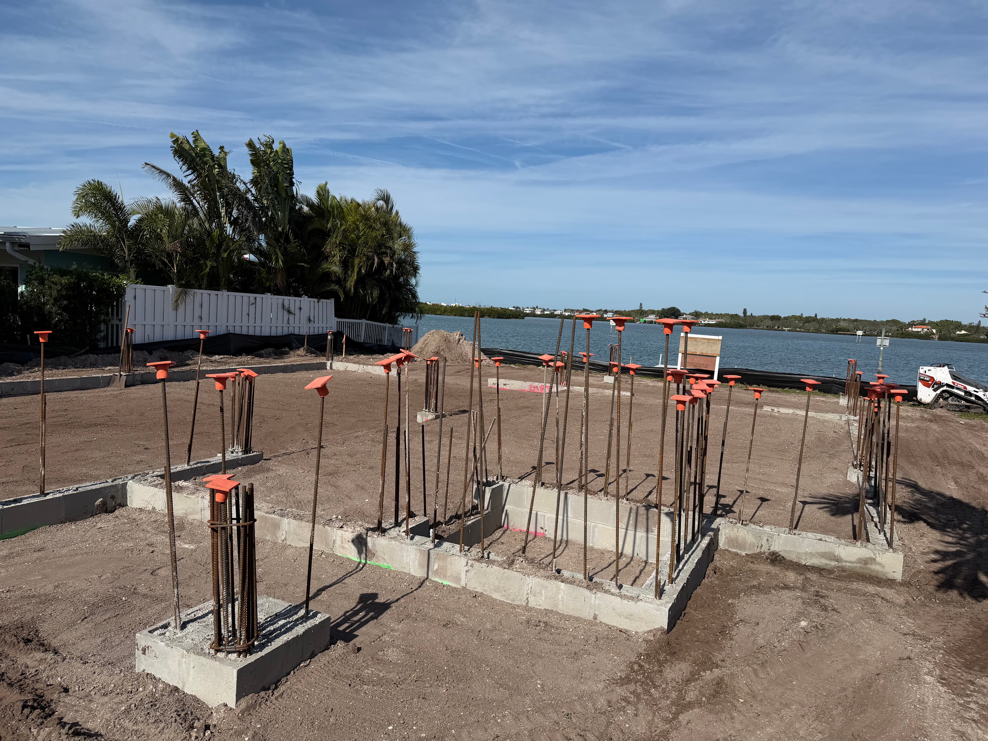 Waterfront foundation preparation during Tampa Bay sitework